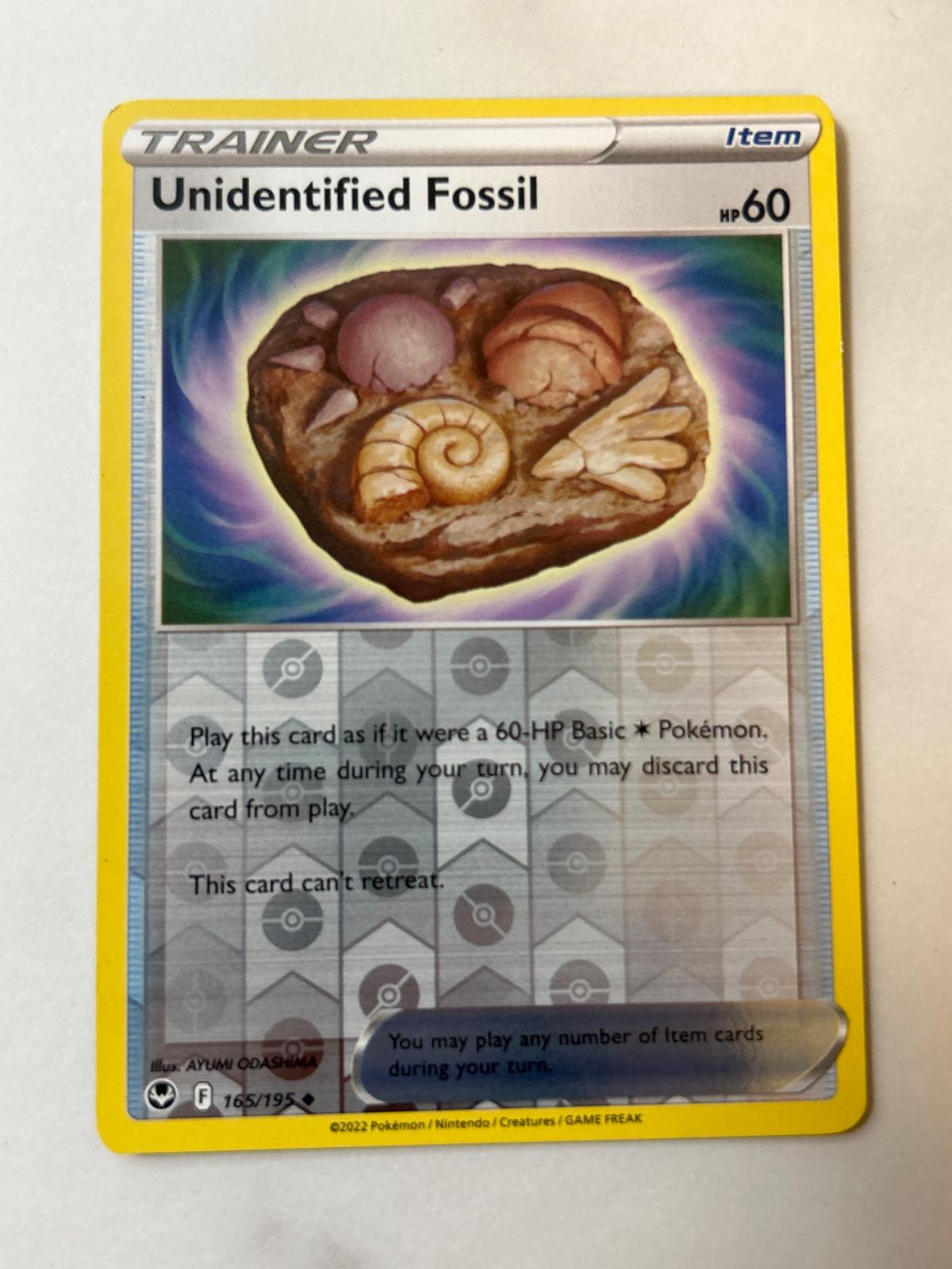 Unidentified Fossil | Lightly Played / English / Reverse Holofoil