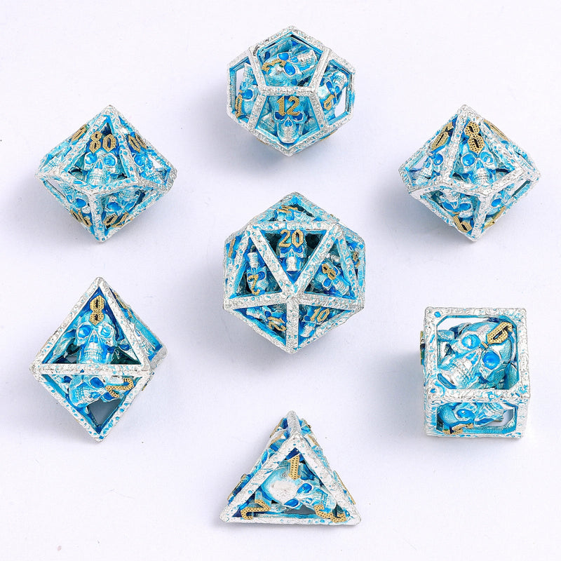 Skull's Grin Hollow Metal Dice Set - Glow in the Dark Blue